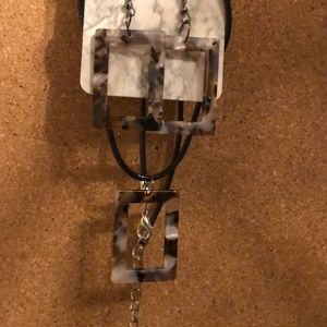 Earrings and necklace set.